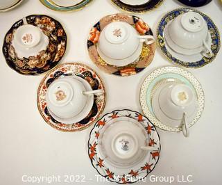 Collection of Fine Porcelain Hand Painted Tea Cups and Saucers. 