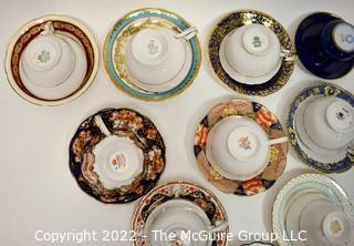 Collection of Fine Porcelain Hand Painted Tea Cups and Saucers. 