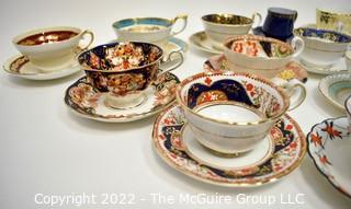 Collection of Fine Porcelain Hand Painted Tea Cups and Saucers. 