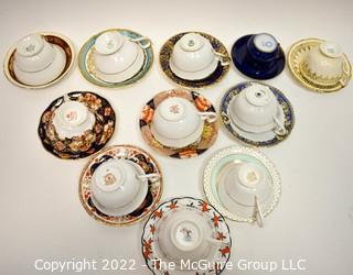 Collection of Fine Porcelain Hand Painted Tea Cups and Saucers. 