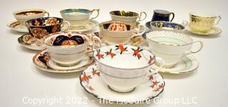 Collection of Fine Porcelain Hand Painted Tea Cups and Saucers. 