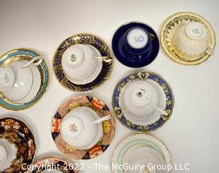 Collection of Fine Porcelain Hand Painted Tea Cups and Saucers. 