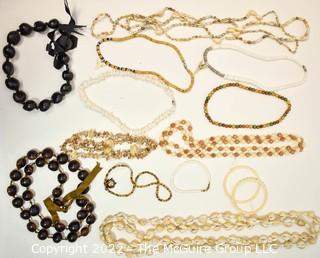 Group of Necklaces Made From Natural Materials - Shells, Puka Shell Beads, Seeds & Shark Teeth.