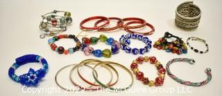 Collection of Beaded Bracelets Including Lampwork Glass, Beads, Rhinestones and Bangles.