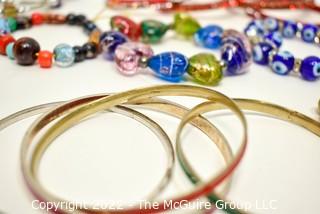 Collection of Beaded Bracelets Including Lampwork Glass, Beads, Rhinestones and Bangles.