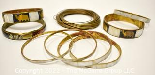 Group of Brass and Inlaid Mother of Pearl Bangle Bracelets. 
