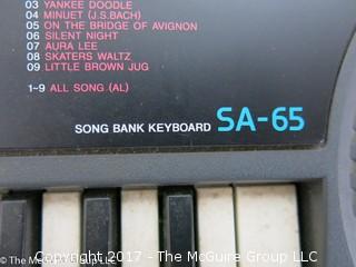 CASIO SA-65 Keyboard Song Bank - electronic mini keyboard - 100 tones - 30 patterns