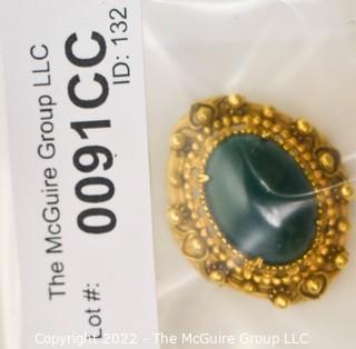 Vintage Green Cabochon Stone in Ornate Gold Surround Florenza Brooch or Pendant.  Measures 1 1/2" long. 
