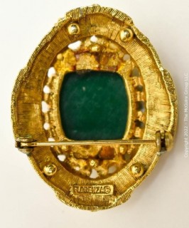 Vintage Green Cabochon Stone in Ornate Gold Surround Florenza Brooch or Pendant.  Measures 1 1/2" long. 
