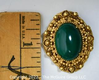 Vintage Green Cabochon Stone in Ornate Gold Surround Florenza Brooch or Pendant.  Measures 1 1/2" long. 
