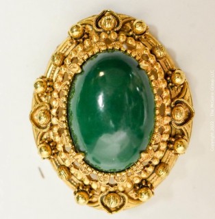 Vintage Green Cabochon Stone in Ornate Gold Surround Florenza Brooch or Pendant.  Measures 1 1/2" long. 
