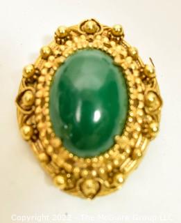 Vintage Green Cabochon Stone in Ornate Gold Surround Florenza Brooch or Pendant.  Measures 1 1/2" long. 
