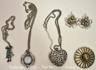 Group of Silver Tone Costume Jewelry.