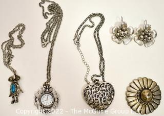 Group of Silver Tone Costume Jewelry.