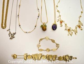 Group of Gold Tone and Pendant Necklaces.