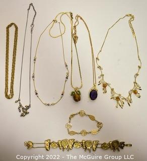 Group of Gold Tone and Pendant Necklaces.