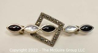 Unmarked Sterling Silver Marcasite, Onyx and Mother of Pearl Brooch.