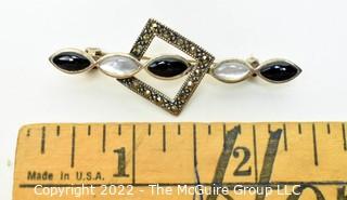 Unmarked Sterling Silver Marcasite, Onyx and Mother of Pearl Brooch.