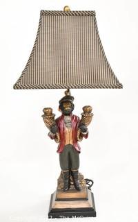 Bellhop Monkey Table Lamp with Striped Shade.  Measures 32" tall with shade. This is the first of two being offered. 