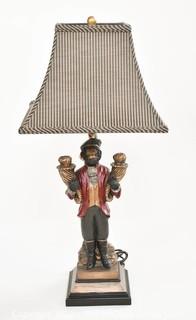 Bellhop Monkey Table Lamp with Striped Shade.  Measures 32" tall with shade. This is the first of two being offered. 