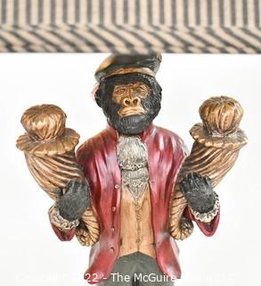 Bellhop Monkey Table Lamp with Striped Shade.  Measures 32" tall with shade. This is the first of two being offered. 