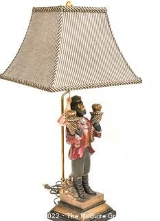 Bellhop Monkey Table Lamp with Striped Shade.  Measures 32" tall with shade.  This is the second of two being offered. 