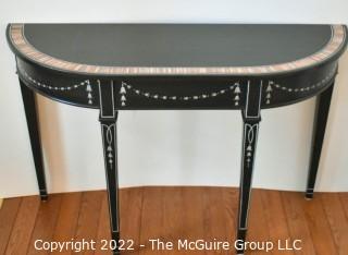 Black with Hand Painted Decoration Demi Lune Console Table. Measures 16" x 30" x 47".