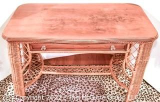 Vintage Wicker Rattan Writing Desk with Drawer.  Some damage to top.  Measures 26" x 30" x 47".