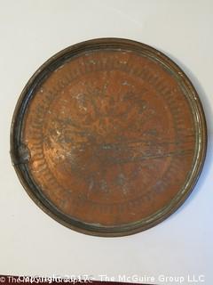 Large stamped Copper serving tray; 23" DIAMETER  