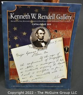 Lot 25.  The Rendells, Inc. and Kenneth Rendell Gallery  

Lists. 15 items.  Nos. 1, 3-10, 12-13, 15-18.  Undated, likely 1970s.  Consist of 8.5” x 14” sheets of paper stapled at upper left and folded in half.

Catalogs (numbered). 160 items.  Nos. 1, 3, 4-10, 12, 14, 16-130, 132-156, 158-164, 169 and 197.  Catalog 1 is from 1959 (according to his website) and catalog 197 from 1991 (from copyright designation in the catalog). Early catalogs are 8.5”x11” paper sheets stapled at upper left.  

In 1981 two catalogs were issued, without catalog numbers, as two volumes with the same title, namely, “The American Frontier: From the Atlantic to the Pacific.”  These can be found listed on Amazon, eBay and other sites for anywhere from $10 to $40.

In 1982 three catalogs were issued, without catalog numbers, in three volumes with the same title, namely, “The History of Mankind.”

Kenneth W. Rendell Gallery.  10 items.  Nos. 300-305, 307-310.  Catalogs are not dated.  An internet search on August