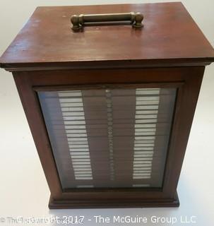 Antique Pathologists cabinet with drawers to hold glass slides; complete with brass top handle and glass door front; 15W x 13D x 19"T