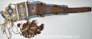 19th Century Prairie, Plains and Plateau Native American Ceremonial Beaded Leather Crupper with Hand Forged Metal Spoon Fringe.  Bead Work mostly intact, but condition issues on verso.  {Note: Description altered 3/6/22 @ 3:53pm ET and more photos added 3-7-22 @ 8:15am ET}