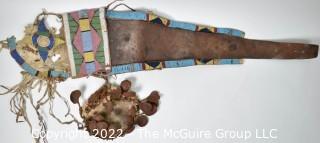 19th Century Prairie, Plains and Plateau Native American Ceremonial Beaded Leather Crupper with Hand Forged Metal Spoon Fringe.  Bead Work mostly intact, but condition issues on verso.  {Note: Description altered 3/6/22 @ 3:53pm ET and more photos added 3-7-22 @ 8:15am ET}