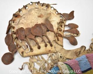 19th Century Prairie, Plains and Plateau Native American Ceremonial Beaded Leather Crupper with Hand Forged Metal Spoon Fringe.  Bead Work mostly intact, but condition issues on verso.  {Note: Description altered 3/6/22 @ 3:53pm ET and more photos added 3-7-22 @ 8:15am ET}