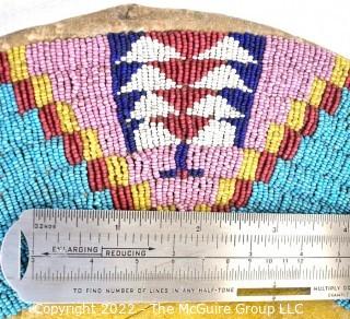 19th Century Prairie, Plains and Plateau Native American Beaded Hide Toy Cradleboard with Applied Doll