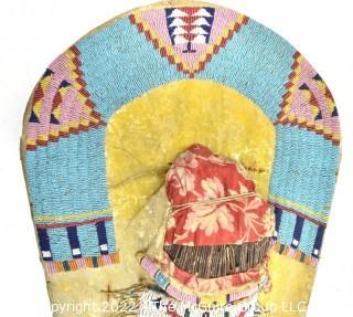 19th Century Prairie, Plains and Plateau Native American Beaded Hide Toy Cradleboard with Applied Doll