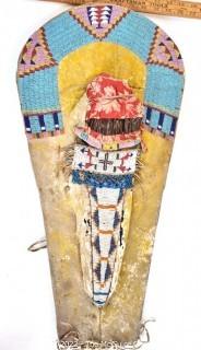 19th Century Prairie, Plains and Plateau Native American Beaded Hide Toy Cradleboard with Applied Doll