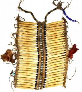 19th Century Prairie, Plains and Plateau Native American Warrior Long Bone and Hide Breastplate.  9" x 11" 