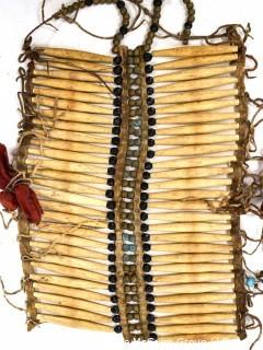 19th Century Prairie, Plains and Plateau Native American Warrior Long Bone and Hide Breastplate.  9" x 11" 