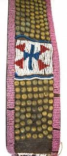 19th Century Prairie, Plains and Plateau Native American Beaded and Tacked Ceremonial Belt with Attached Beaded Pouch. 