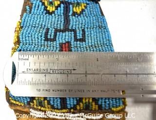 19th Century Prairie, Plains and Plateau Native American Beaded and Tacked Ceremonial Belt with Attached Beaded Pouch. 