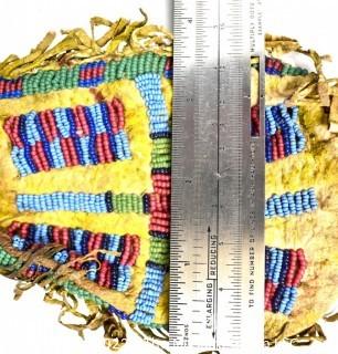 19th Century Prairie, Plains and Plateau Native American Beaded Hide Pouch with Rawhide Fringe.  