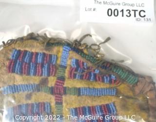 19th Century Prairie, Plains and Plateau Native American Beaded Hide Pouch with Rawhide Fringe.  