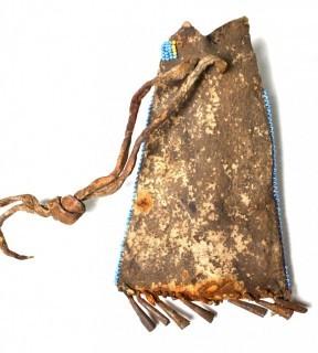 19th Century Prairie, Plains and Plateau Native American Blue, Yellow and Red Beaded Pouch with Metal Cone Shaped Bells on Edge and Rawhide Drawstring