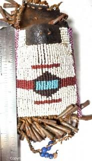 19th Century Native American White Beaded Hide Pouch with Forged Bell Trim.