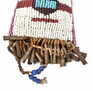 19th Century Native American White Beaded Hide Pouch with Forged Bell Trim.