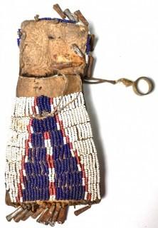 19th Century Native American White with Blue Teepee Design Beaded Hide Pouch with Brass Ring and Bell Fringe. 