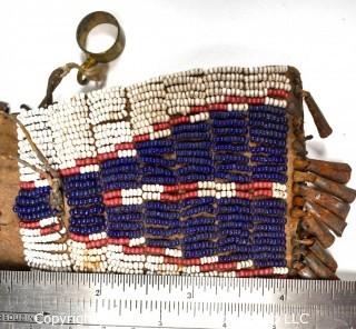 19th Century Native American White with Blue Teepee Design Beaded Hide Pouch with Brass Ring and Bell Fringe. 