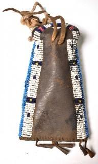 19th Century Native American Beaded Hide Pouch with Bell Fringe.