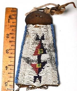 19th Century Native American Beaded Hide Pouch with Bell Fringe.